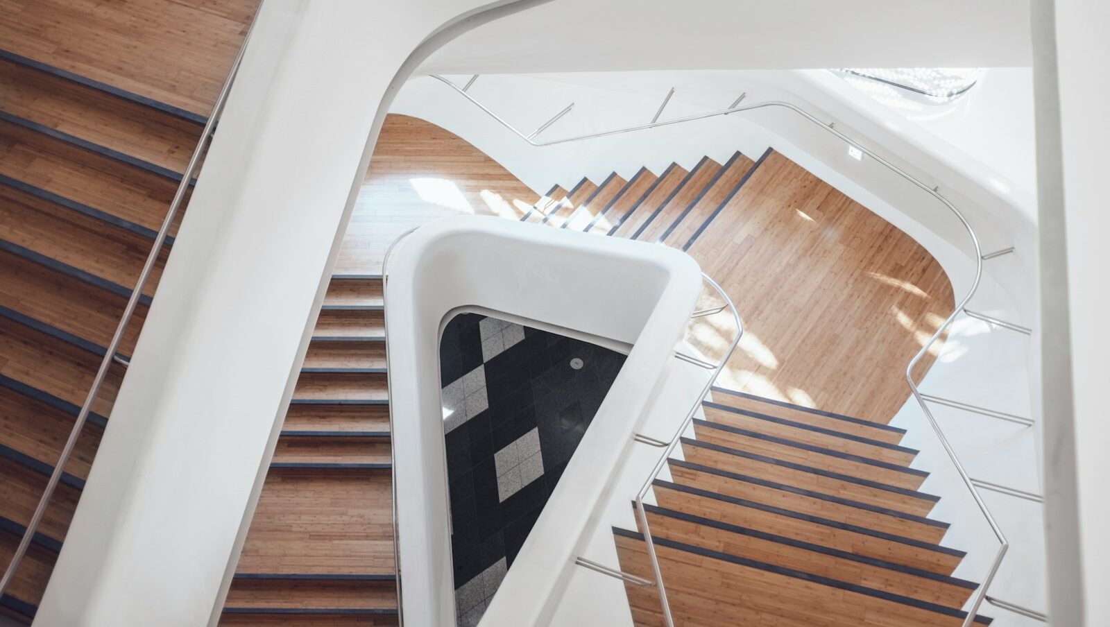 top view of brown spiral stairs